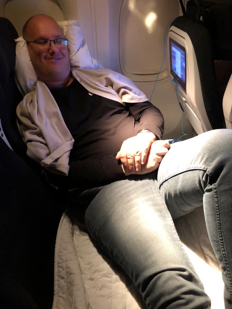 Chris gets some shut-eye on the Air NZ Skycouch.